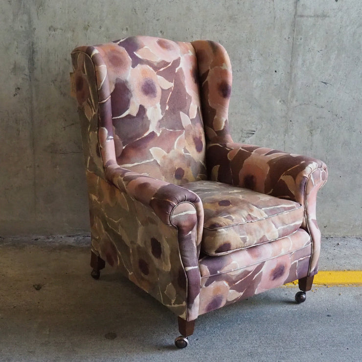 Antique winged armchair recovered in Designers Guild fabric with flowers